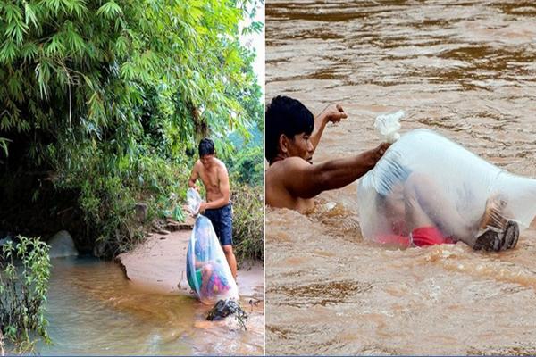 เด็กถูกนำใส่ถุงพลาสติก พาข้ามแม่น้ำไหลเชี่ยว เพื่อไปโรงเรียนอีกฝั่ง